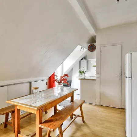 With Balcony Under The Roofs Of *