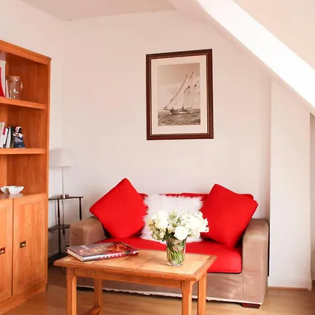Apartment With Balcony Under The Roofs Of Paris