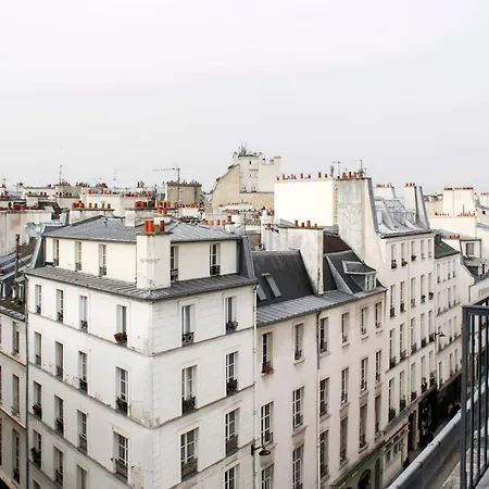 With Balcony Under The Roofs Of *