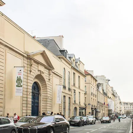 Apartment With Balcony Under The Roofs Of Paris