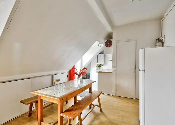 With Balcony Under The Roofs Of *