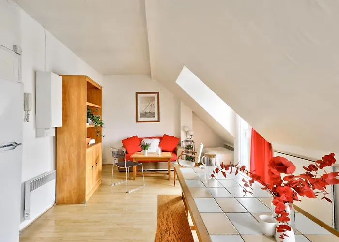 With Balcony Under The Roofs Of