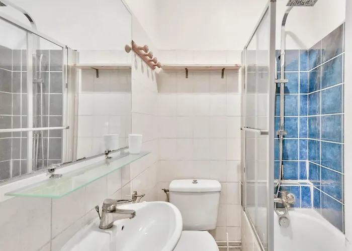 With Balcony Under The Roofs Of