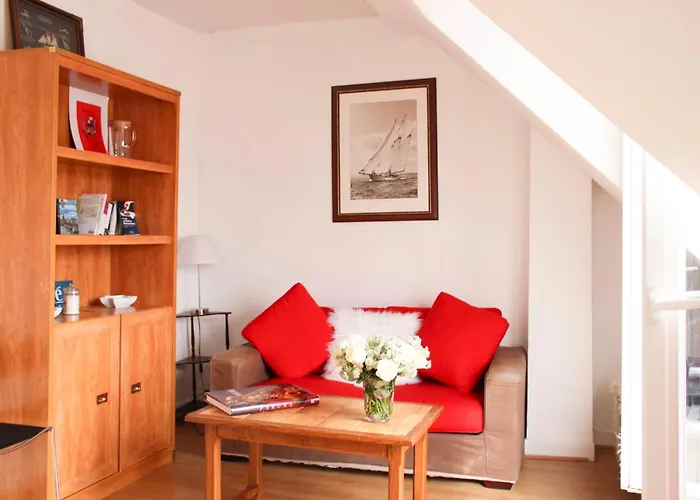 Apartment With Balcony Under The Roofs Of Paris