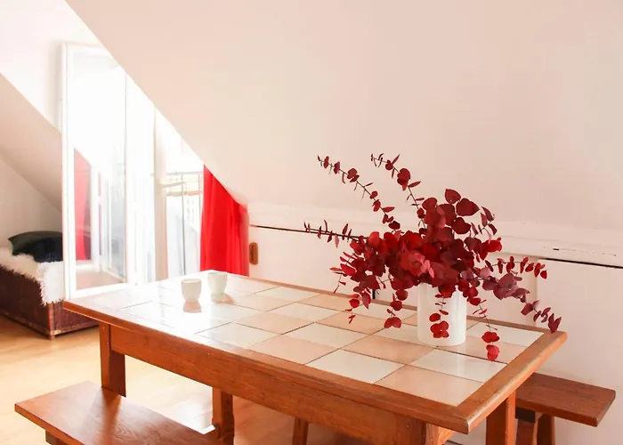 Apartment With Balcony Under The Roofs Of Paris