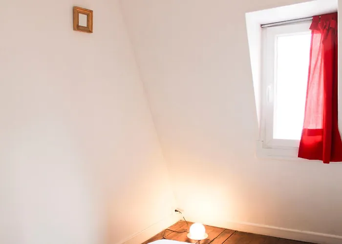 With Balcony Under The Roofs Of Apartment *