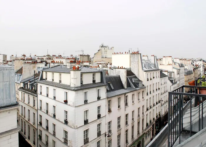With Balcony Under The Roofs Of *