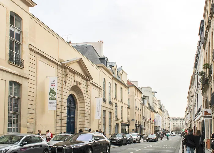 Apartment With Balcony Under The Roofs Of Paris